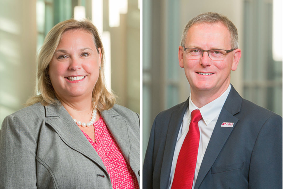 Stephanie Lopez, current global vice president of operations, and Jeff Wilson, new global vice president of operations at AIB International