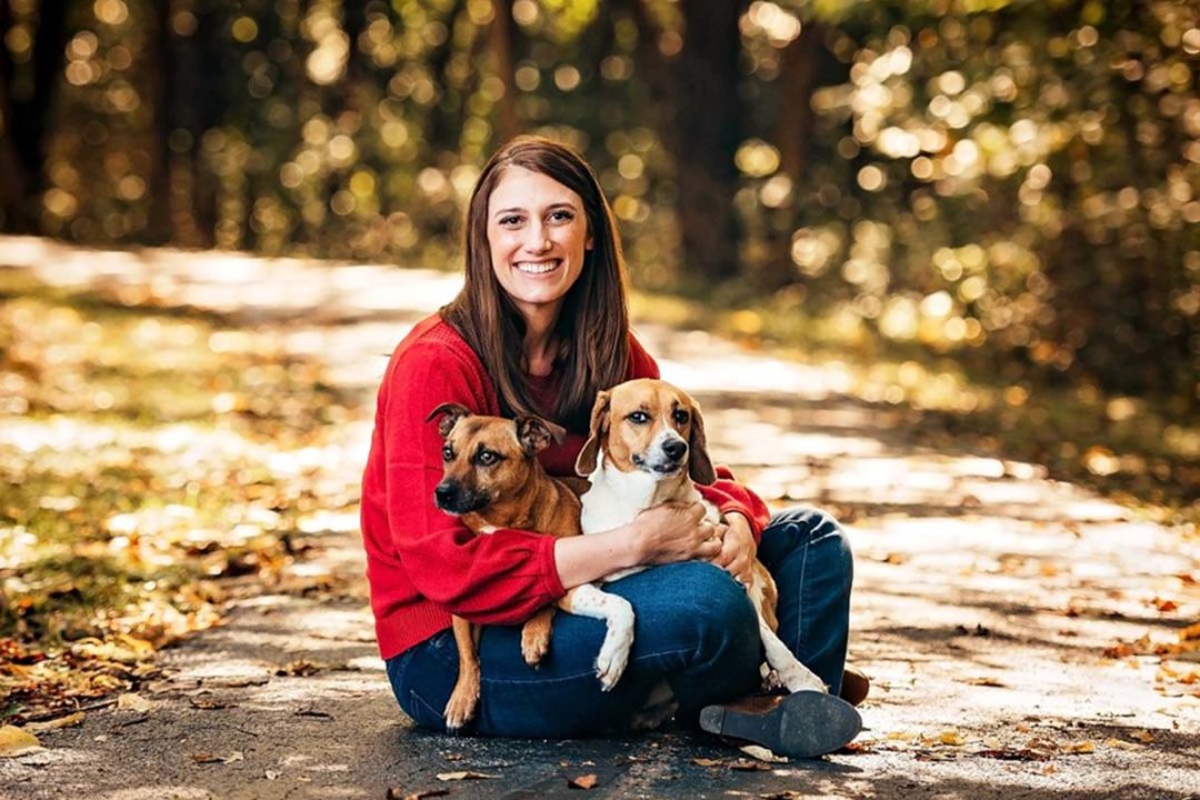 Stephanie Clark, Ph.D., of BSM Partners with her two dogs, Anny and Gracie Lou Freebush
