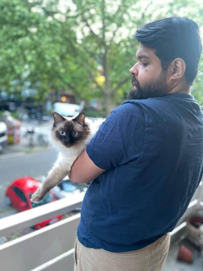 Co-Founder Rachit Shadra and his cat Obi