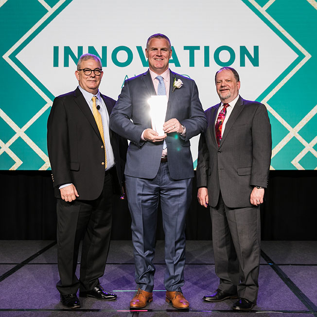 From Left to Right: Richard Beldon, president and chief executive officer of SourceAmerica; Pete Yuska, general manager of ECHO Barkery; Mark Lezotte, board chairman of SourceAmerica.