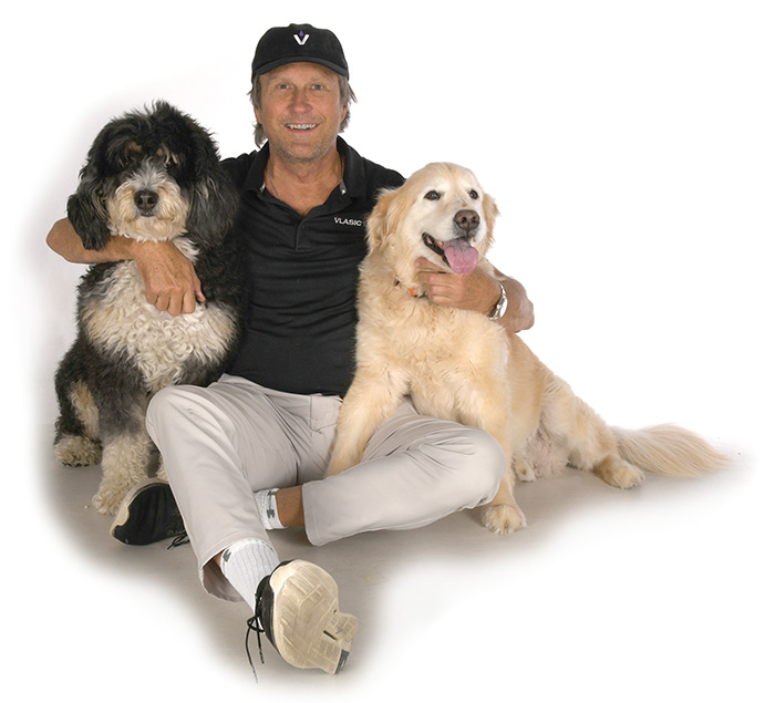 Rick Vlasic, founder and chief executive officer of Vlasic Labs, with his dogs Yogi and Ozzy
