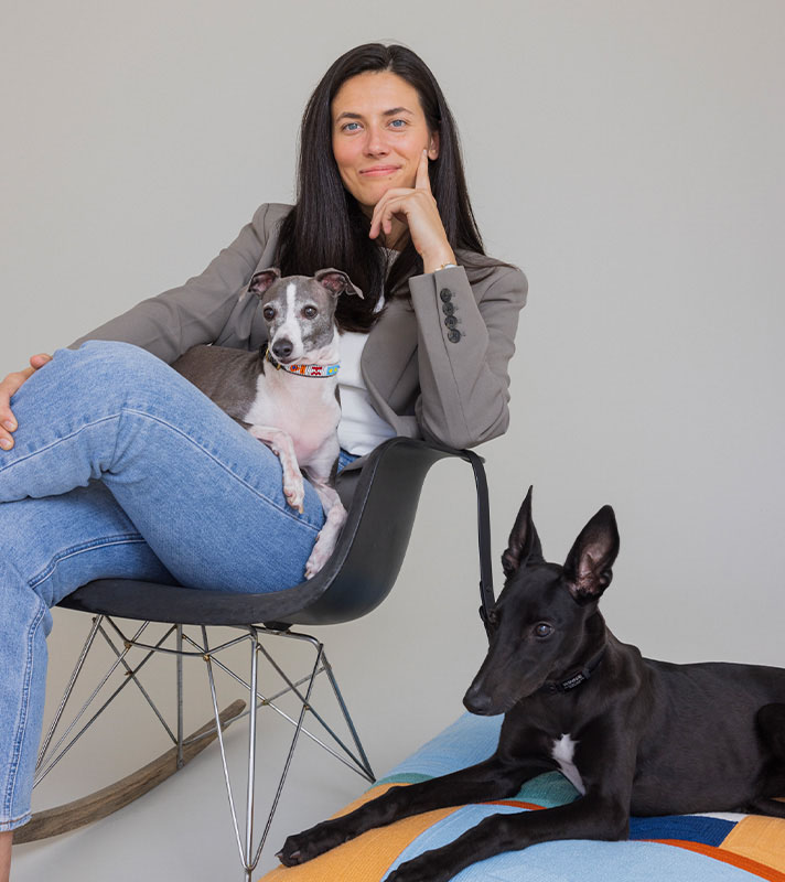 Katie Spies, founder and CEO of Maev, with her two dogs George (left) and Winnie