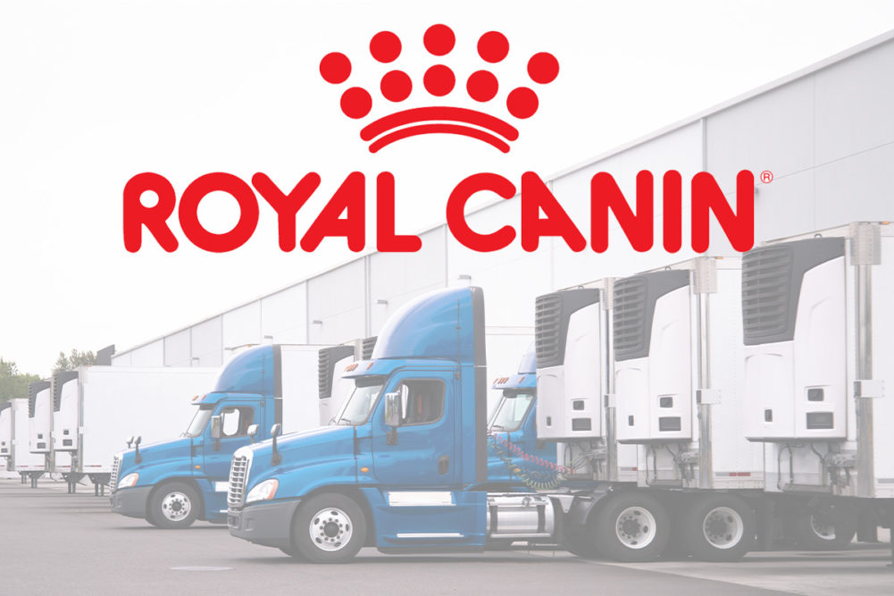 Royal Canin logo with semi-truck background (©STOCKR - STOCK.ADOBE.COM)