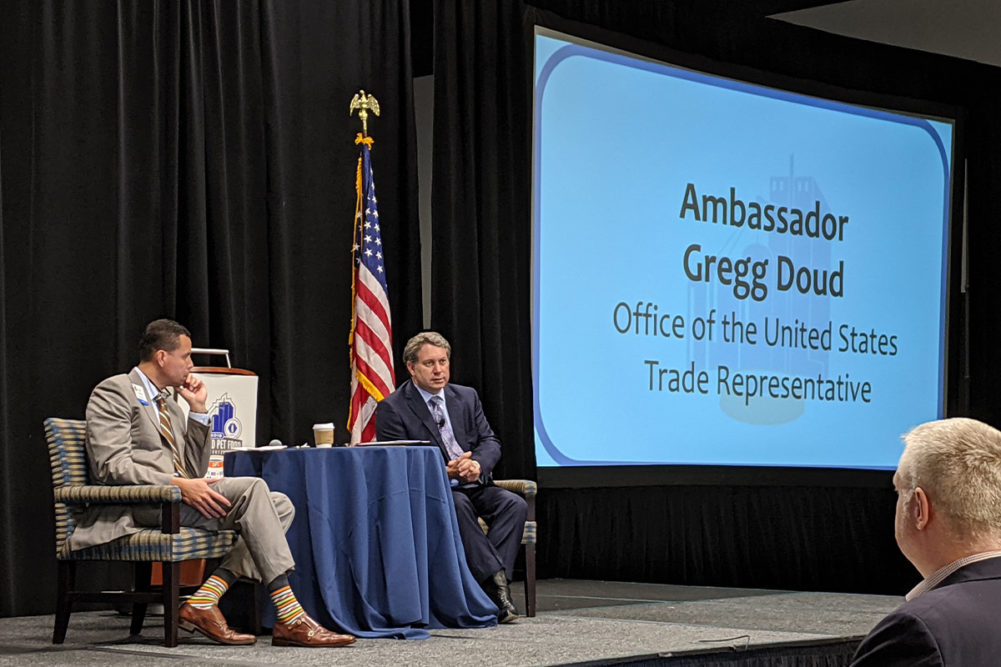 Peter Tabor, vice president of regulatory and international affairs for Pet Food Institute, discusses trade topics with Chief Agricultural Negotiator Gregg Doud with the Office of the United States Trade Representative (USTR).