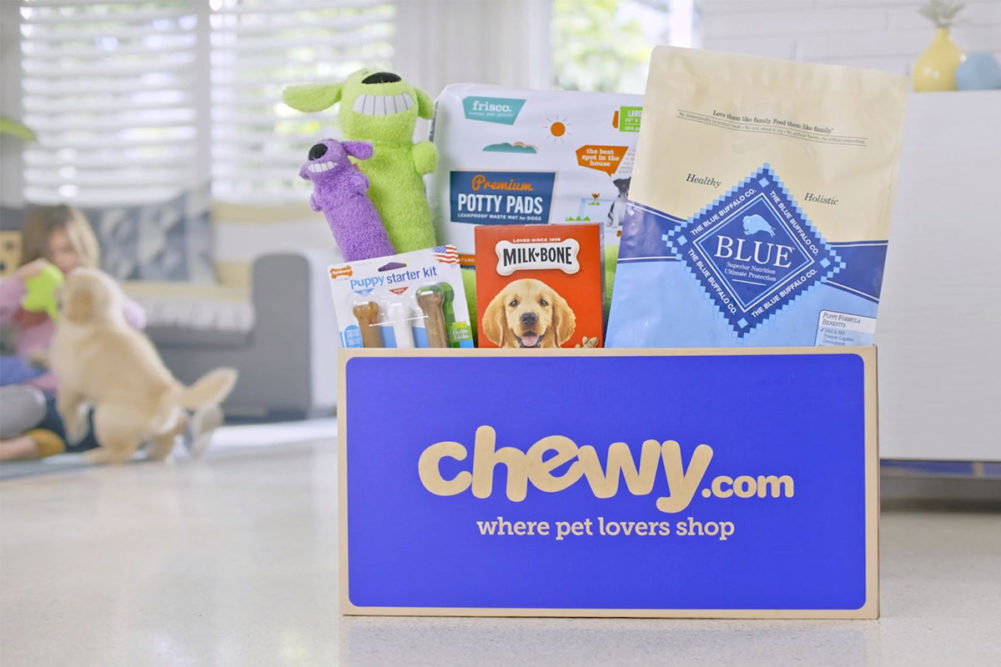 Pet food and toy products in Chewy subscription delivery box