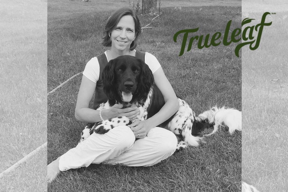Conny Mosley, DVM, with her dog and True Leaf logo